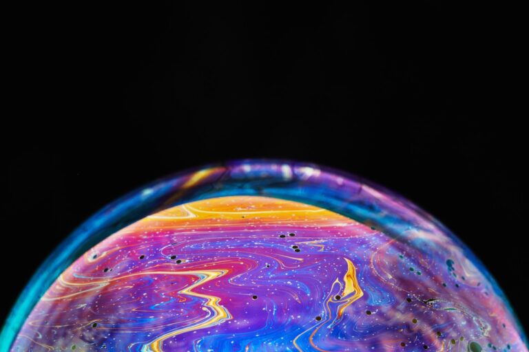 Virtual reality space with abstract multicolor psychedelic planet. Closeup Soap bubble like